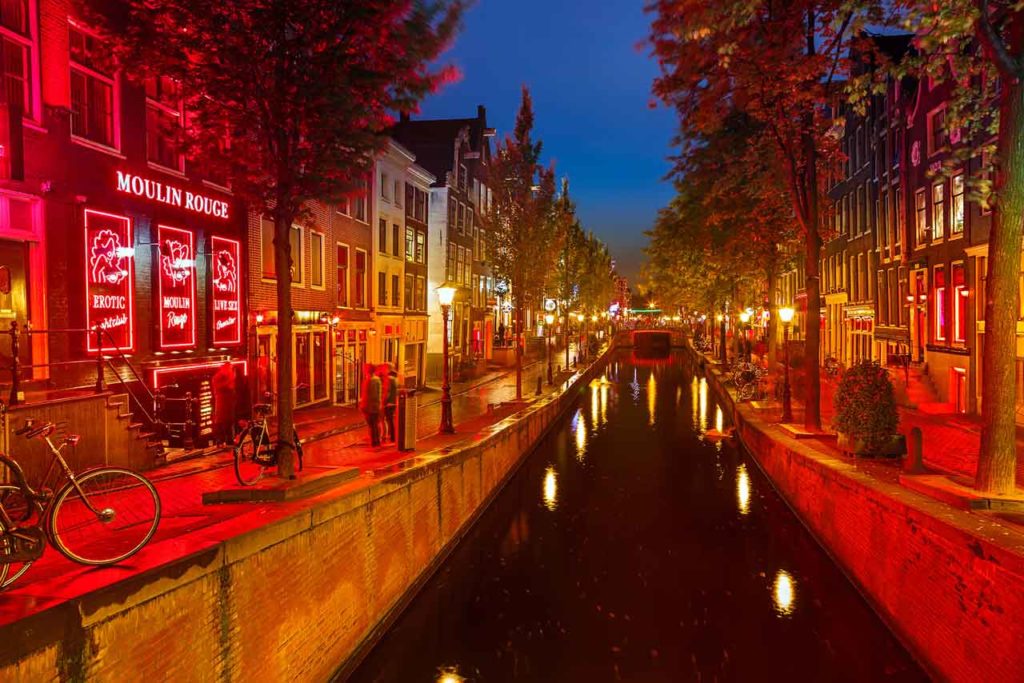 Red light district by night - sightseeing and adventure